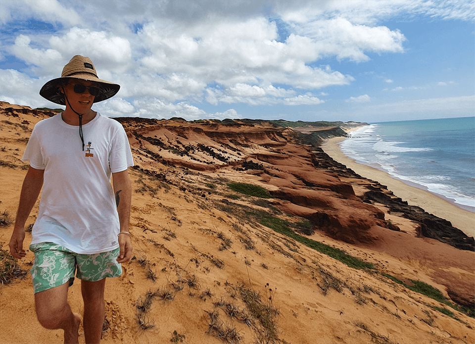 Myself walking along a beach in Brazil